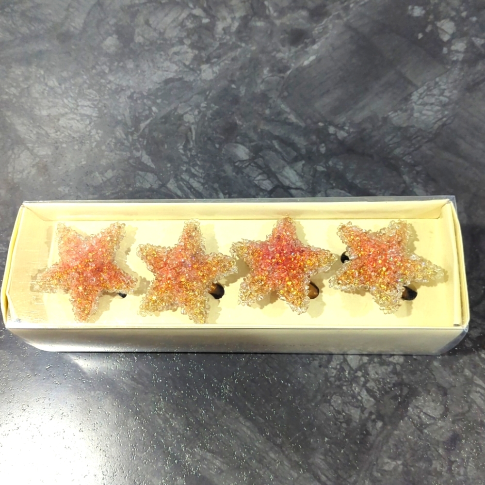 Pier 1 imports 1 Set of 4 Shiny Glittery Starfish Star Shaped Napkin Rings